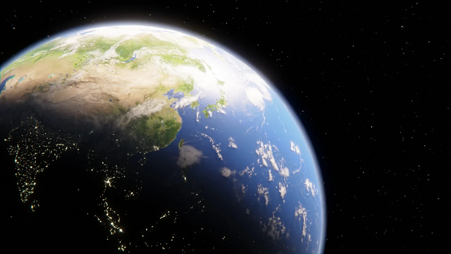 The Earth from orbit, with city lights showing on the night side