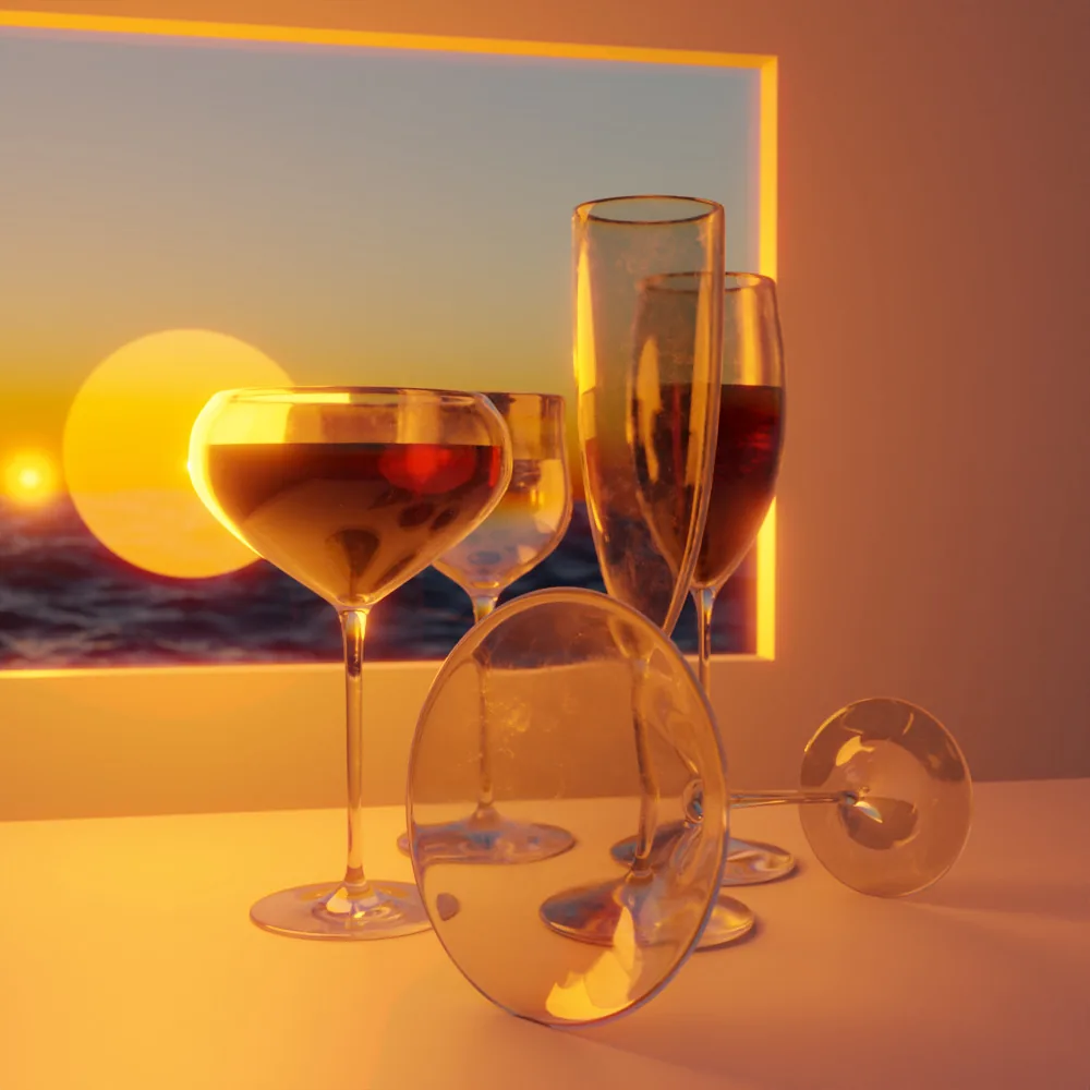 Wine glasses on a table, lit orange by a sunset through the window behind